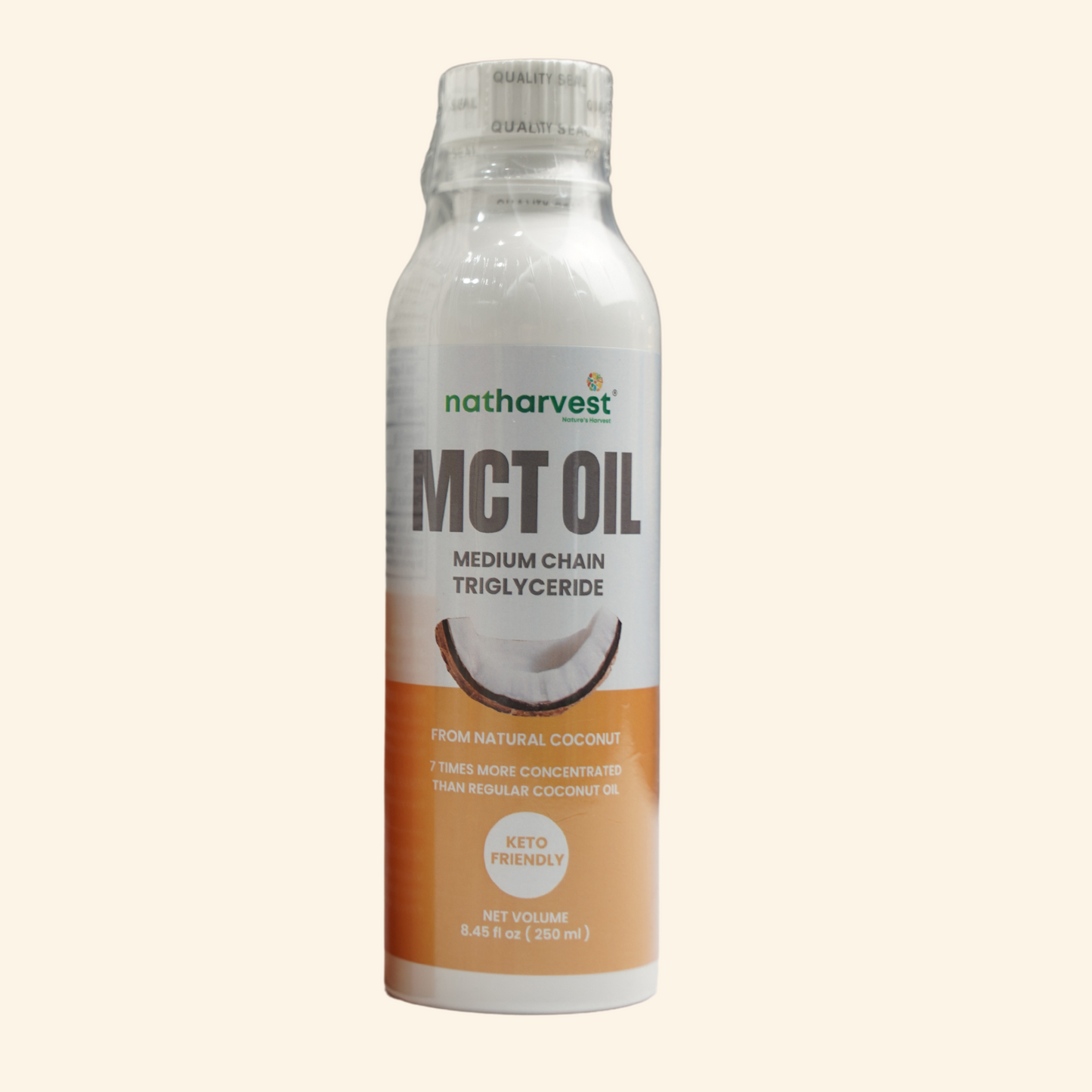 Bottle of Natharvest MCT oil on a light beige background