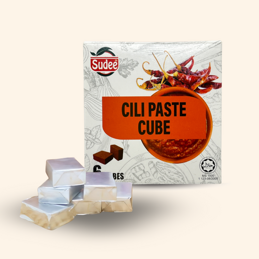 Sudee Cili Paste Cube packaging with cubes on a light beige background